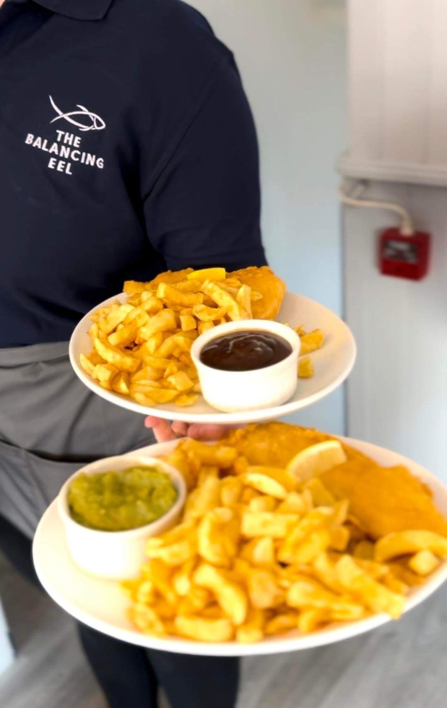 Plates of chips carried to the table